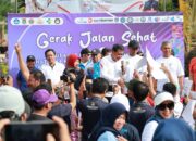 Bupati Tangerang Tebar Bibit Ikan dan Melepas Peserta Gerak Jalan Sehat