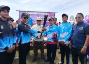 Camat Mekar Baru Terima Estafet Kirab Obor PORKAB VI Kabupaten Tangerang 2025